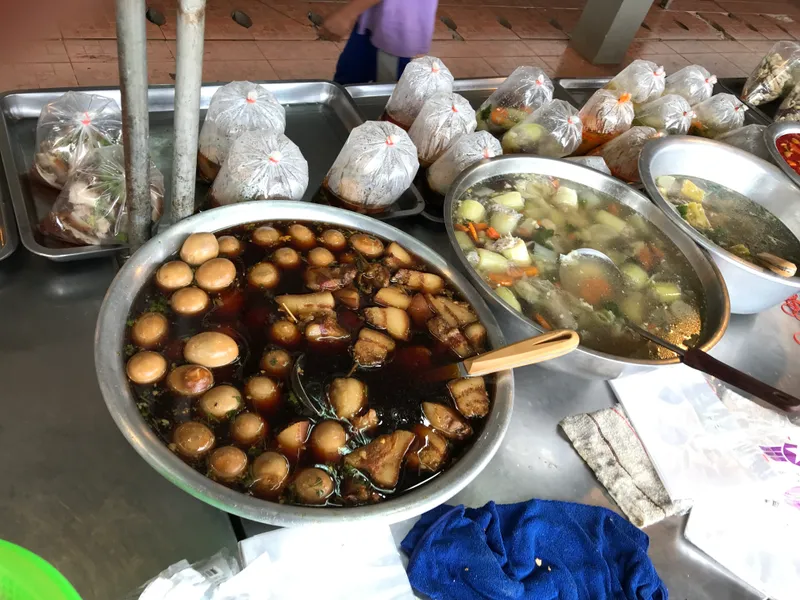 Braised eggs and pork belly simmering at the market